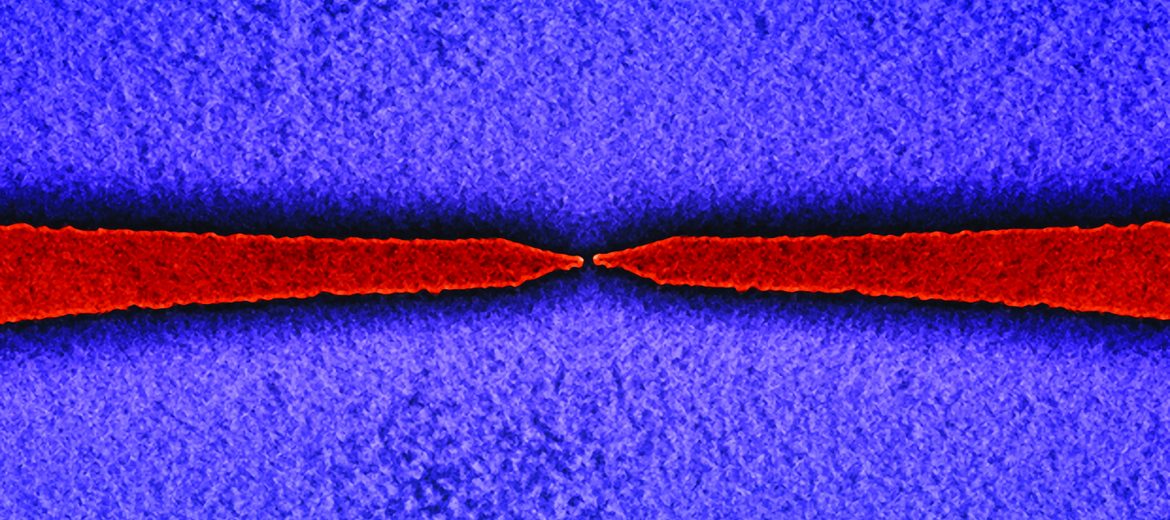 COLOUR-ENHANCED SEM IMAGE OF A NANOSCALE GAP IN A METAL ELECTRODE PAIR WITH STRONG ELECTRON TRANSPORT.